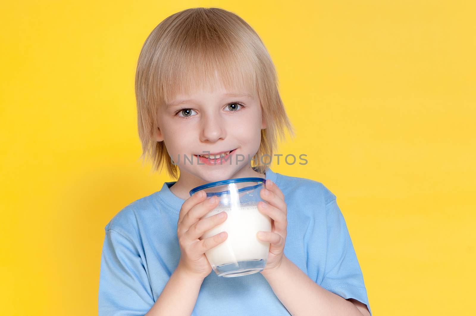 Little boy drinking milk