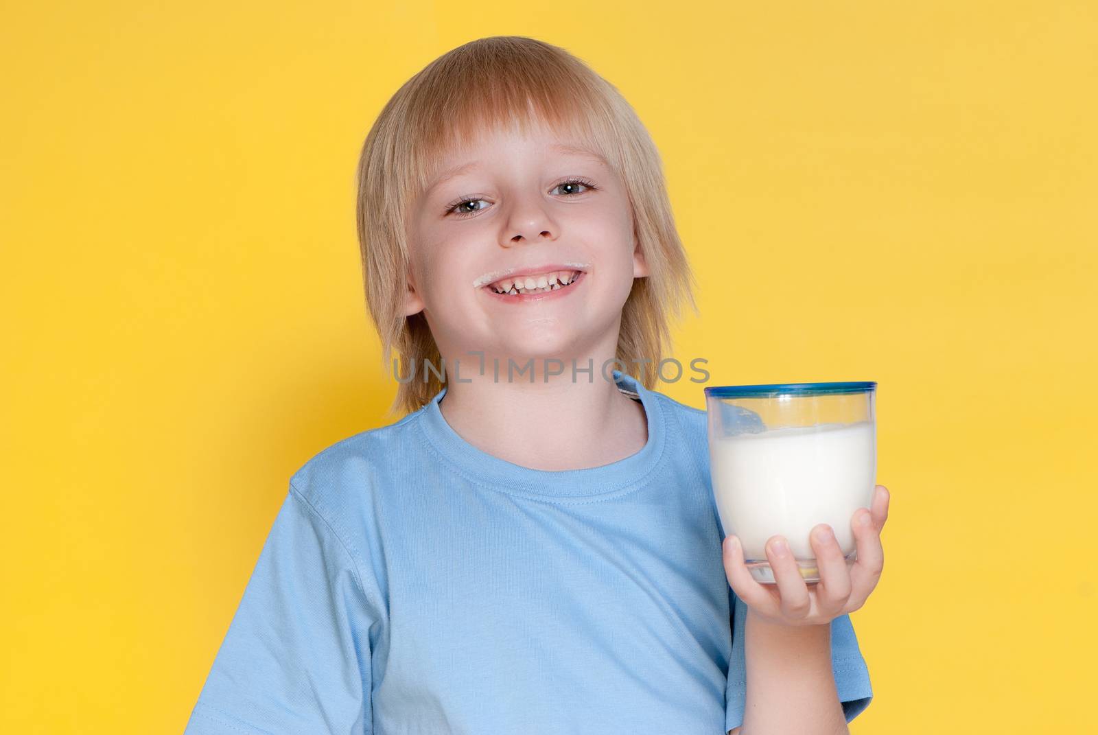 Little boy drinking milk