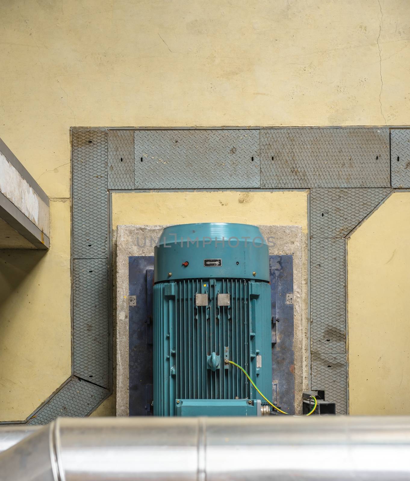 Electric Industrial generator inside power plant closeup