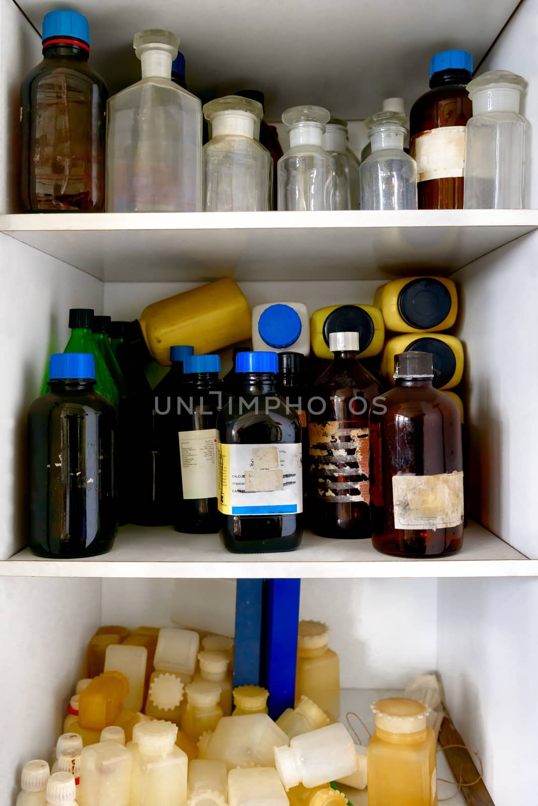 Old laboratory with a lot of bottles and dirt