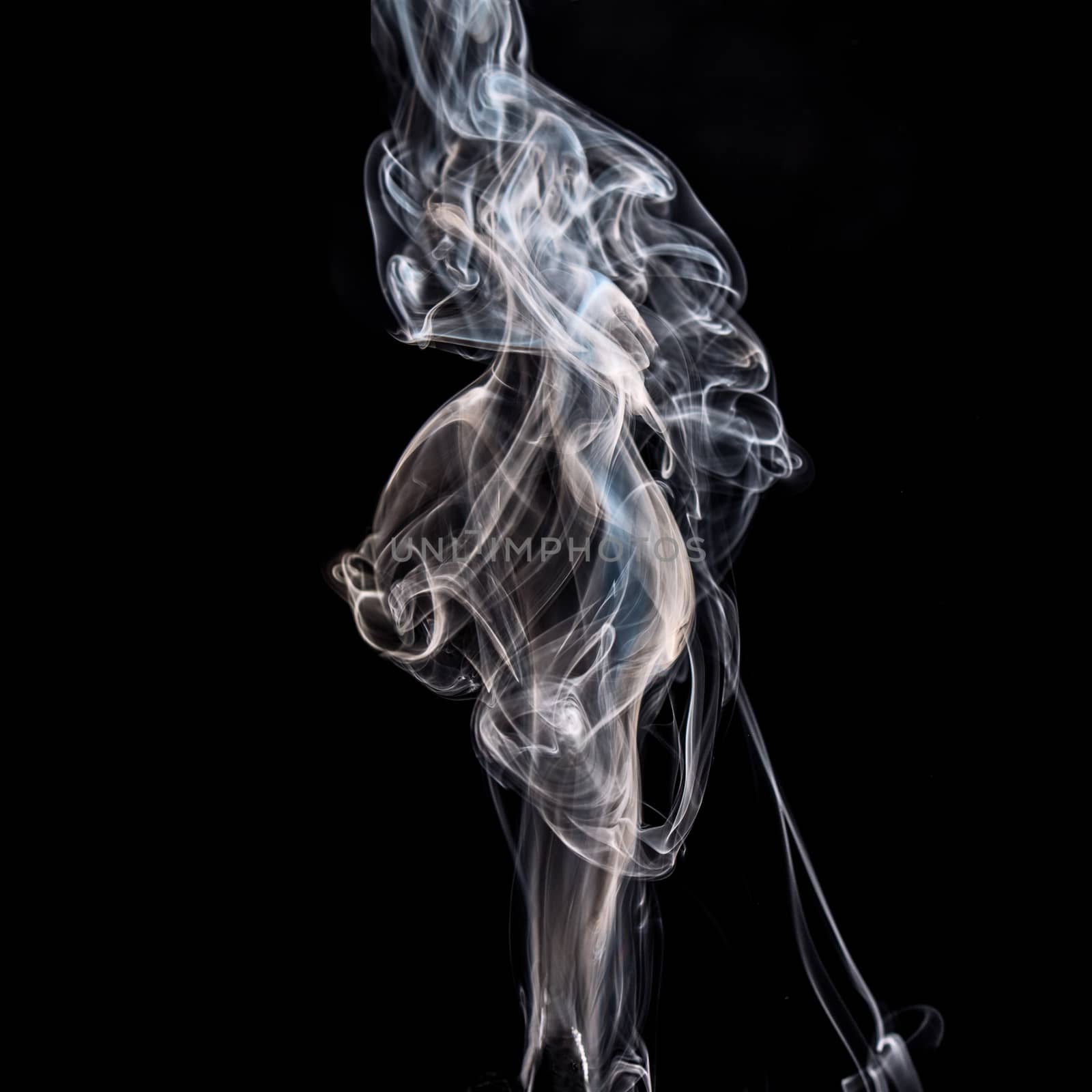 illuminated smoke that propagates on a black background