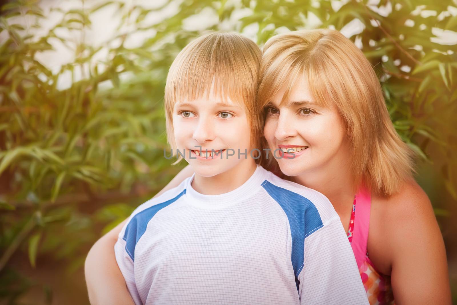 happy mother and son in park by Anpet2000