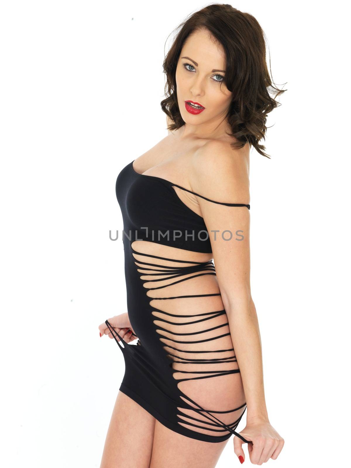 Sexy Young Pin Up Model Revealing Black Dress by Whiteboxmedia