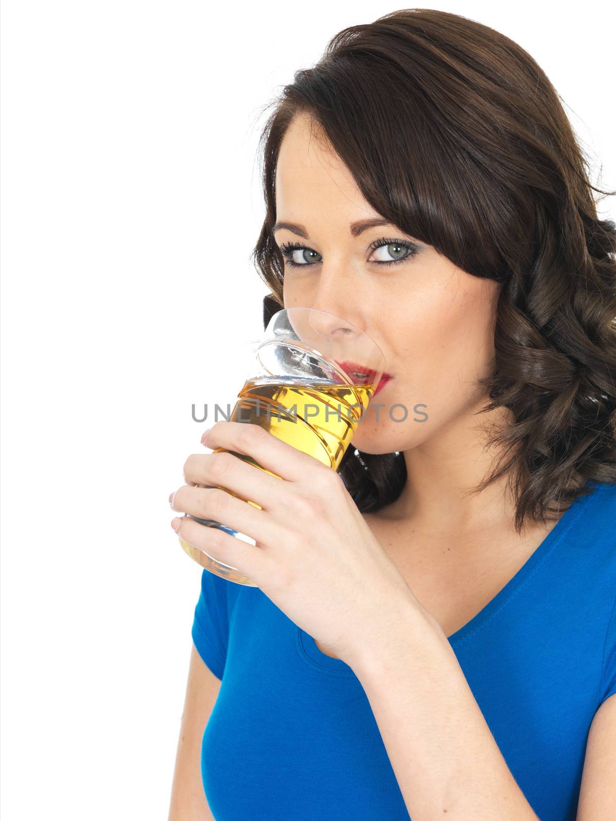 Attractive Young Woman Drinking Apple Juice by Whiteboxmedia