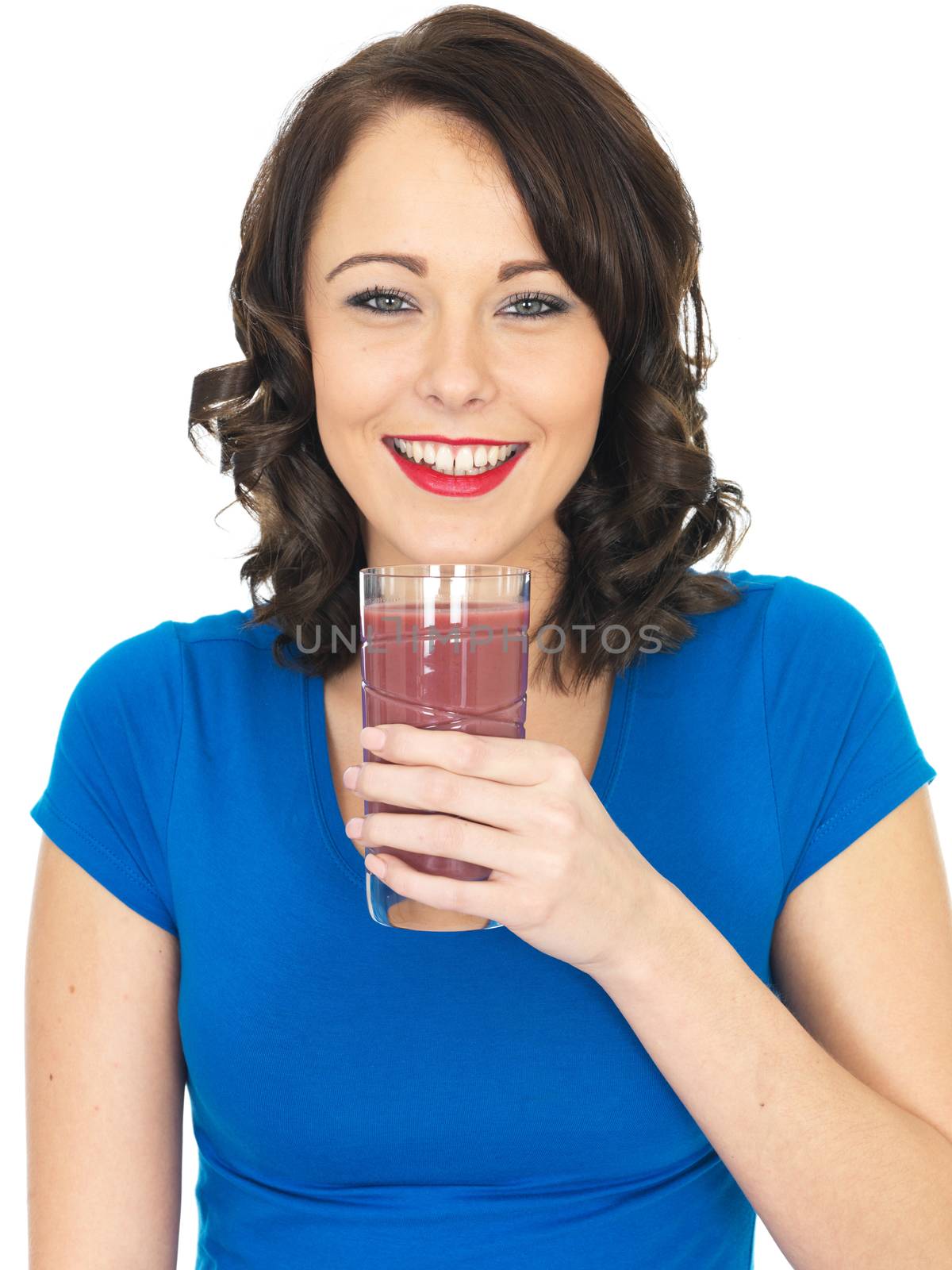 Attractive Young Woman Drinking a Fruit Smoothie