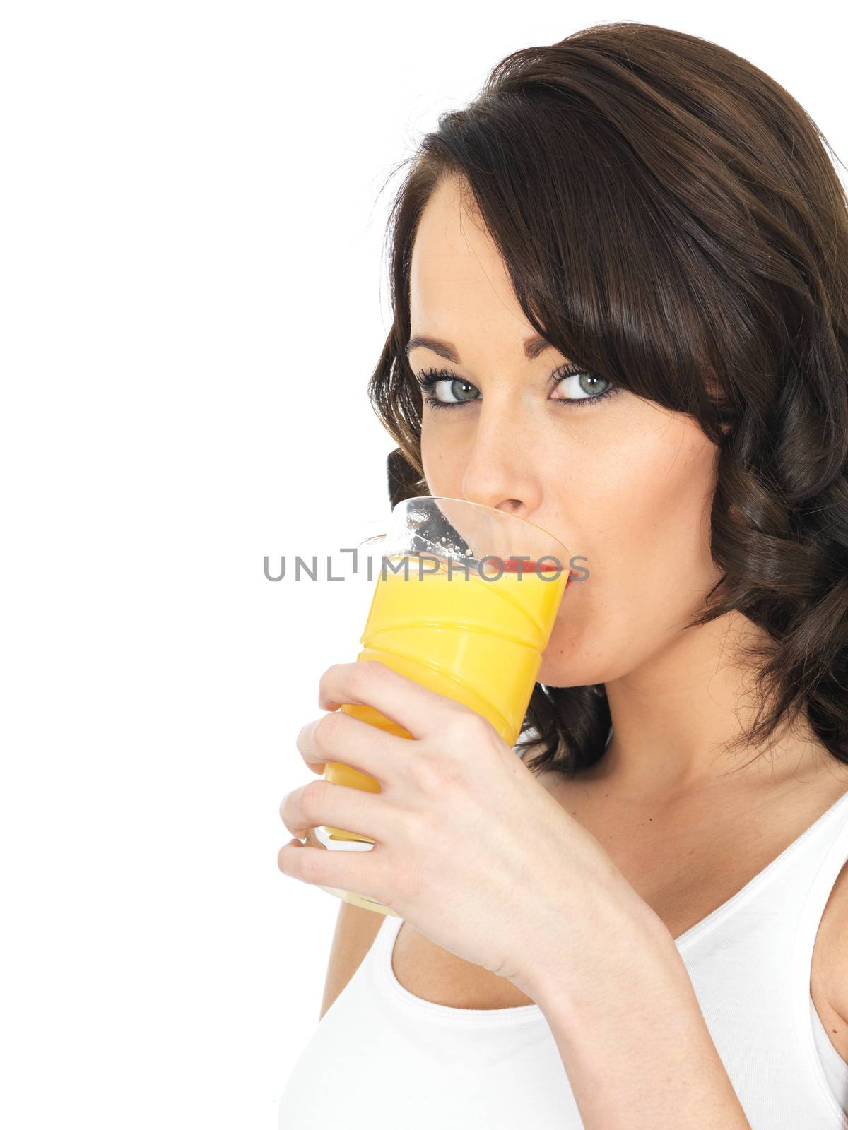 Young Woman Drinking Orange Juice by Whiteboxmedia