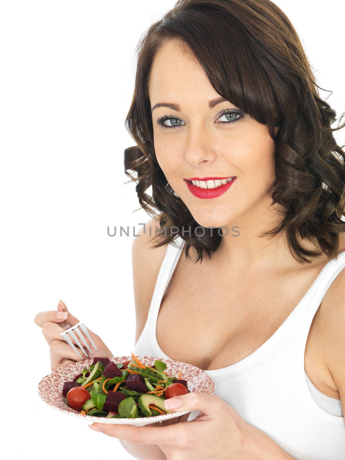 Attractive Young Healthy Woman Eating Mixed Salad