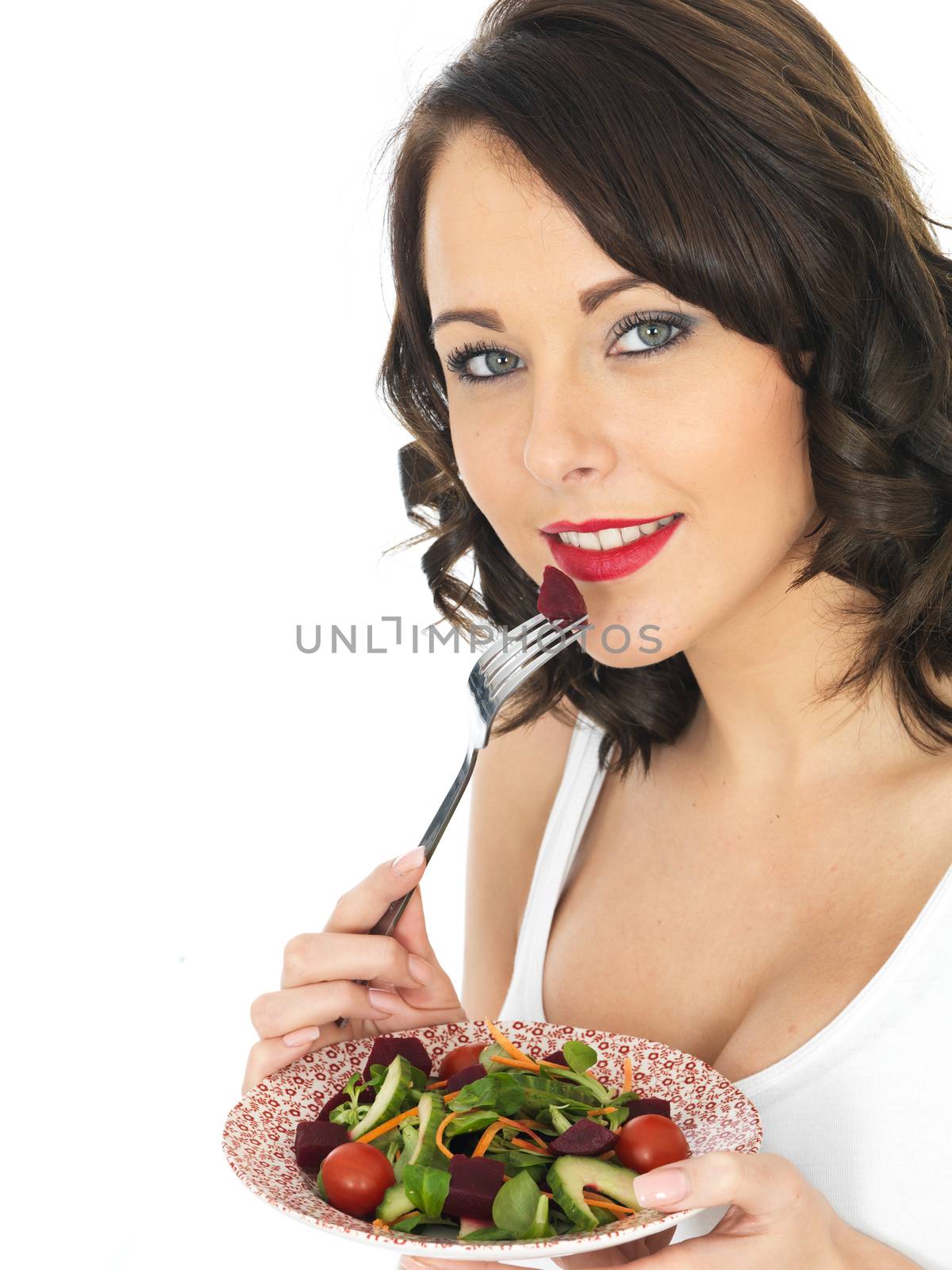 Young Woman Eating Salad by Whiteboxmedia