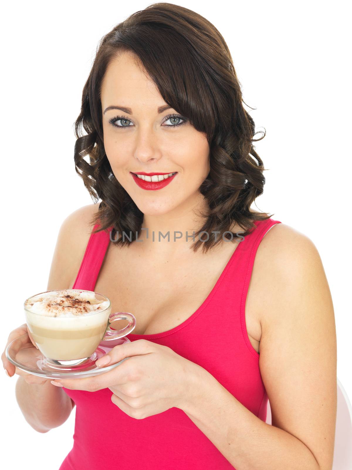 Attractive Young Woman Holding a Cup of Cappuccino
