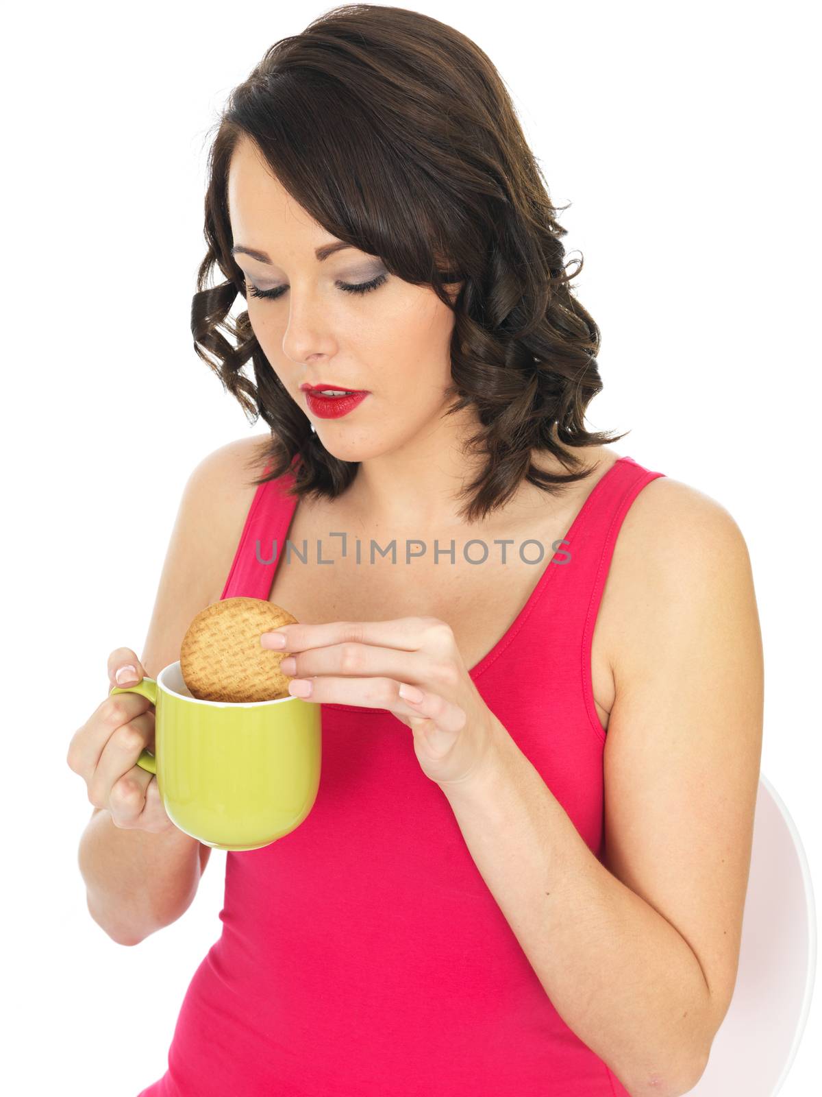 Attractive Young Woman With Tea and Biscuits