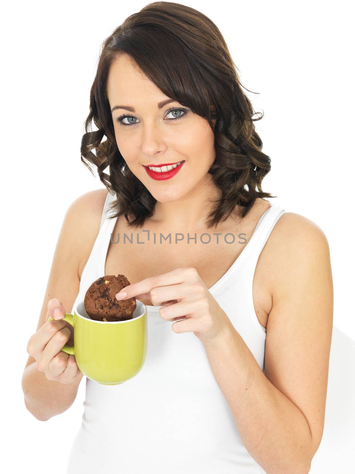 Young Woman with a Mug of Tea and Biscuit by Whiteboxmedia