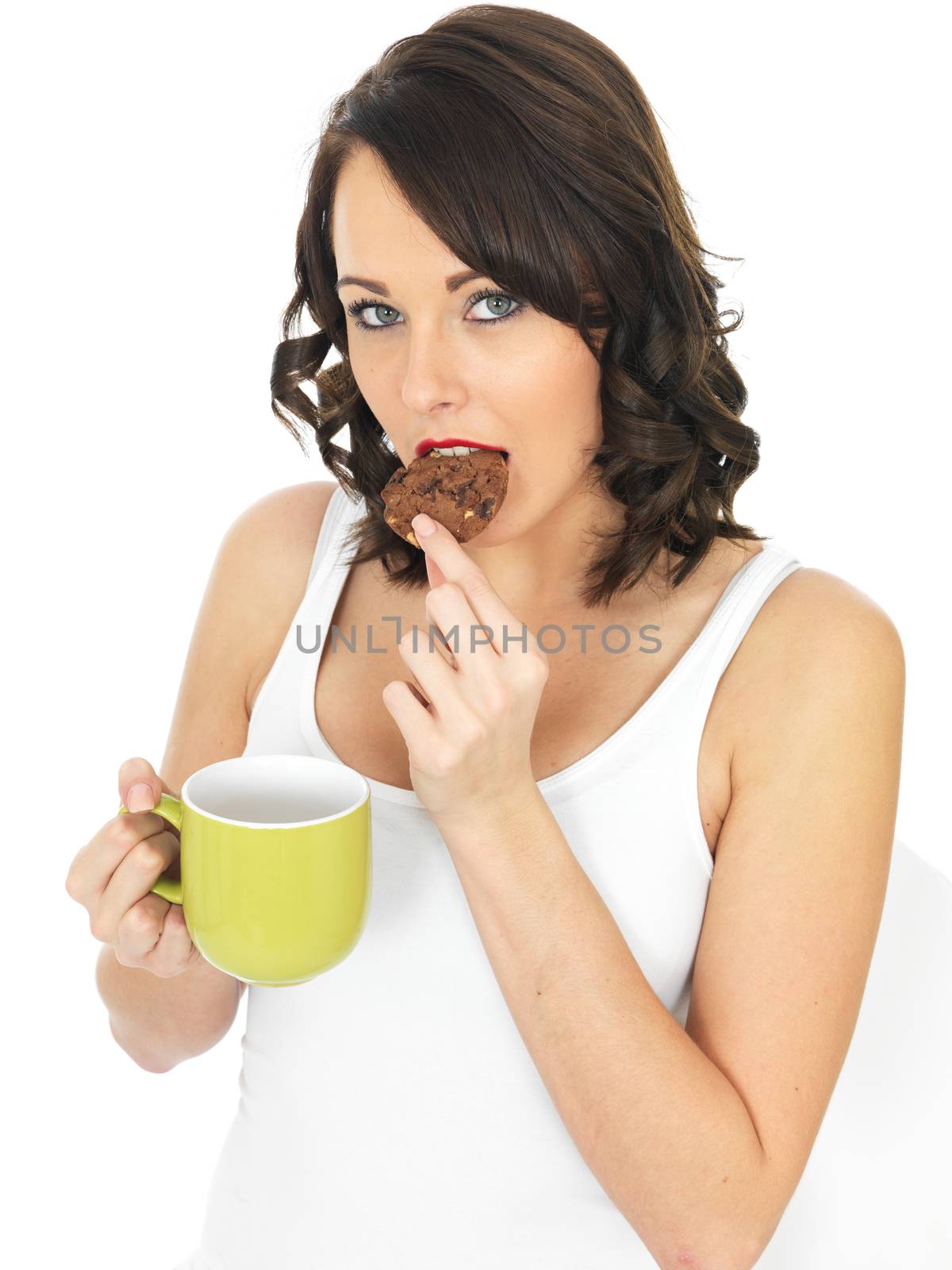 Young Woman with a Mug of Tea and Biscuit by Whiteboxmedia