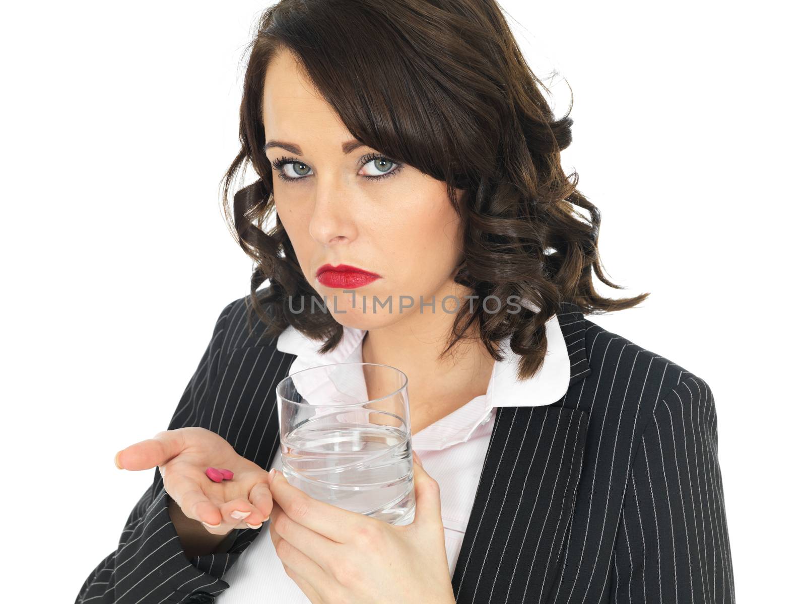 Young Business Woman Taking Medicine Pills by Whiteboxmedia