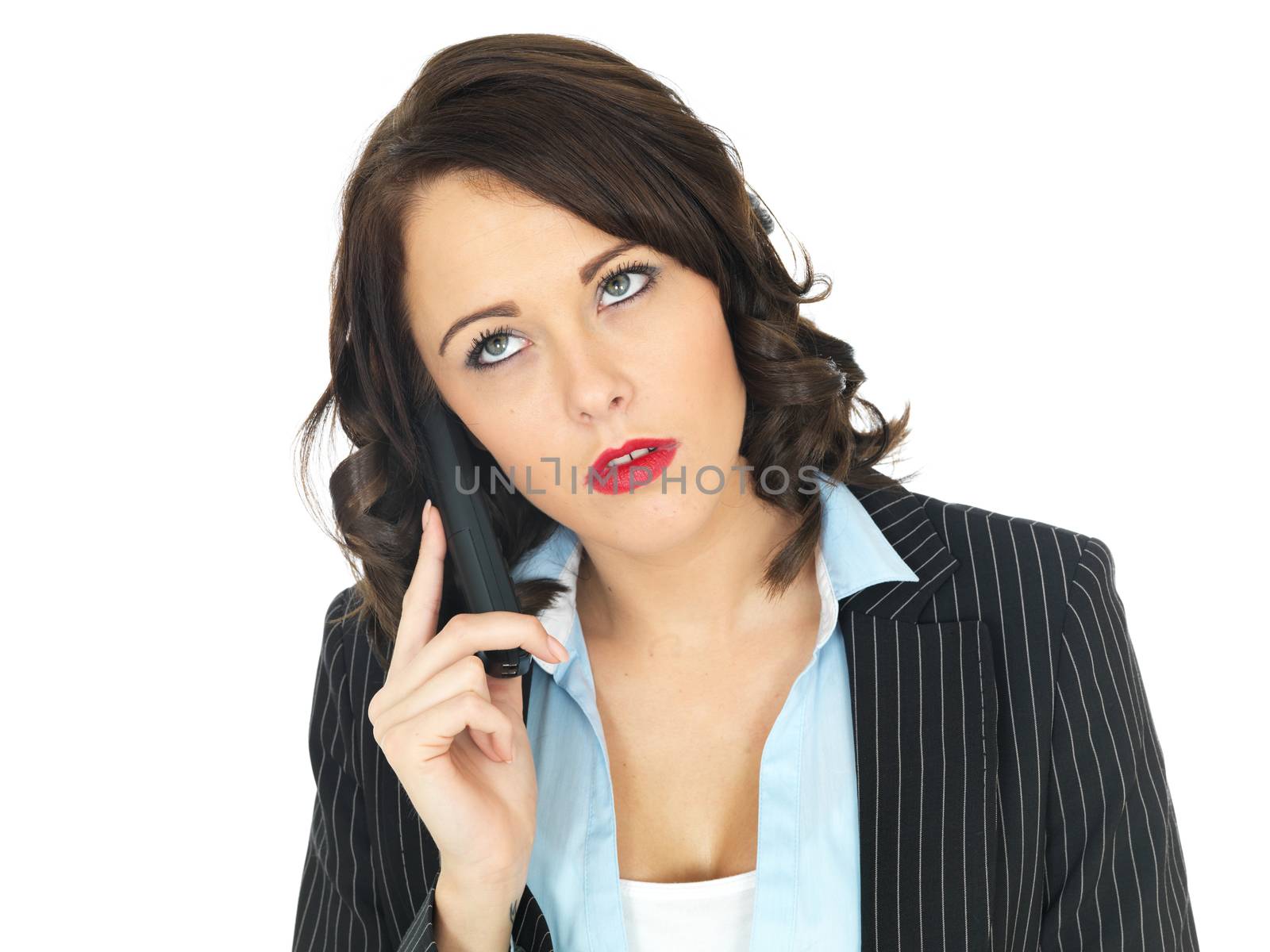 Young Business Woman Using a Telephone by Whiteboxmedia