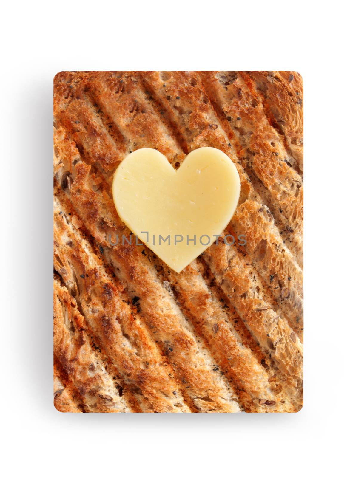 Heart shape slice of cheese on toasted whole grain bread over a white background