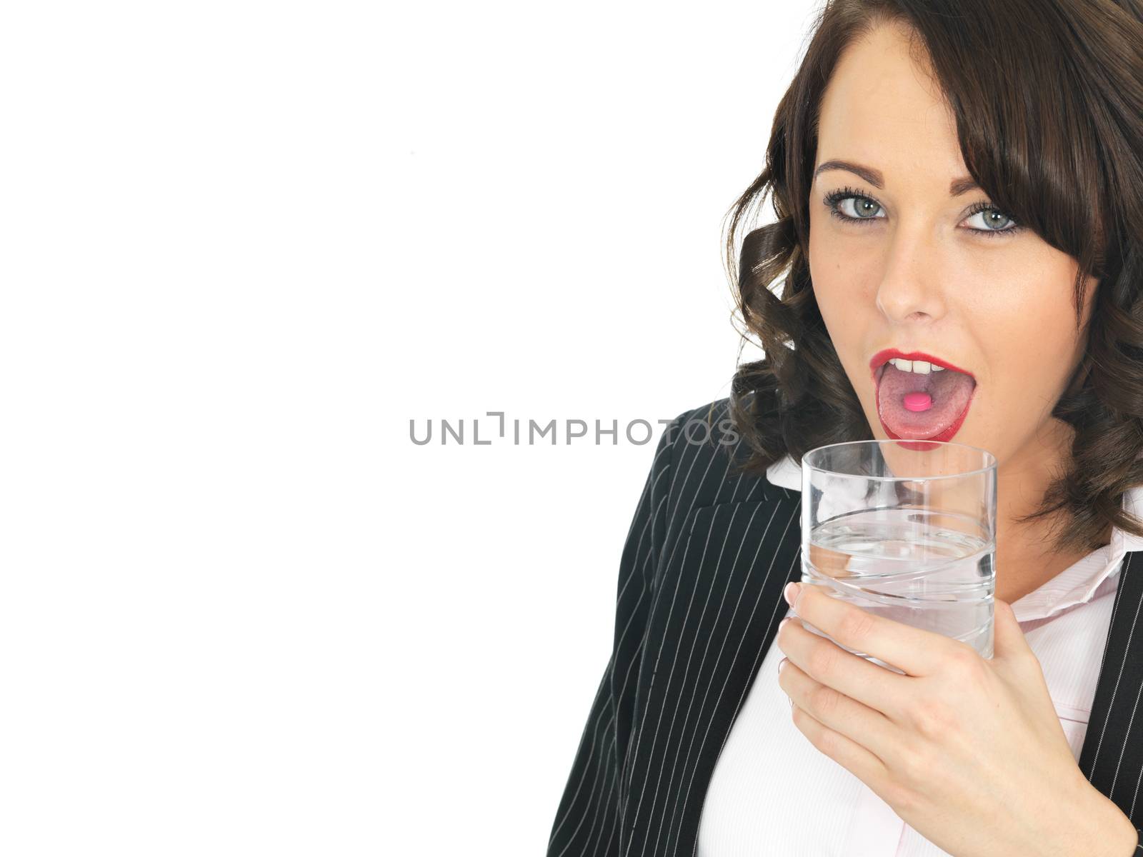 Young Business Woman Taking Medicine Pills by Whiteboxmedia