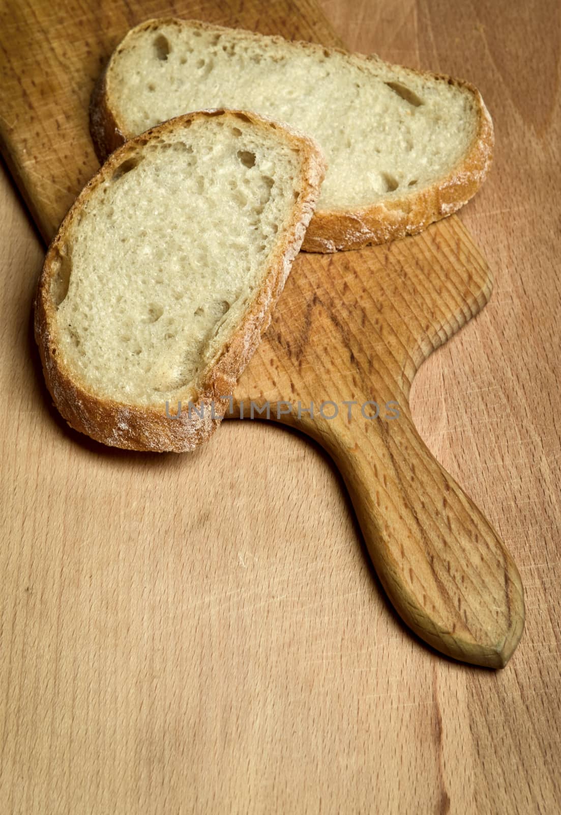 still life with sliced bread on a cutting board