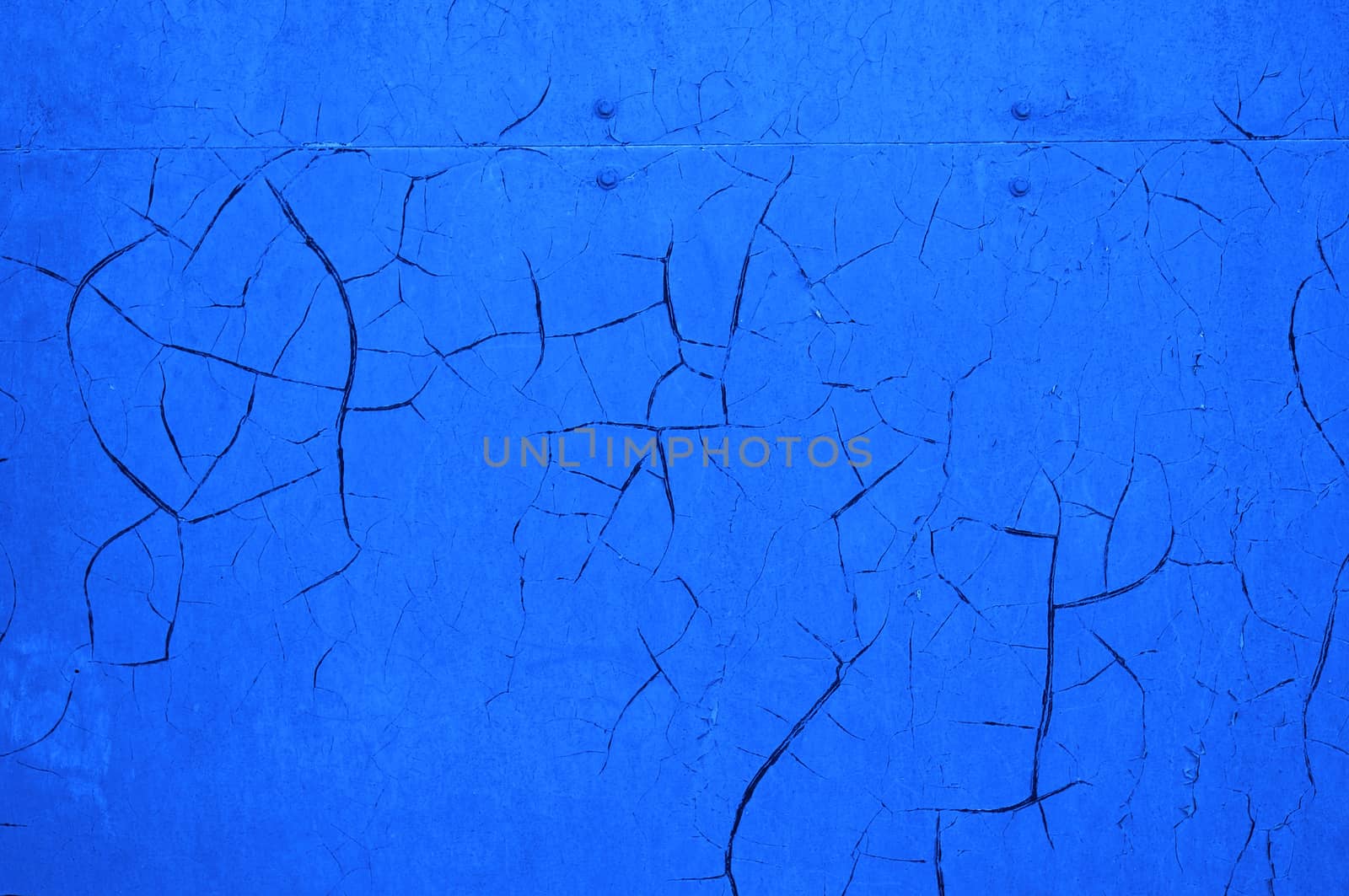  Blue cracked wall as an abstract background                              