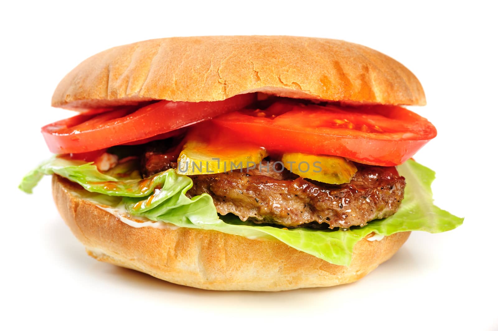 single fresh realistic looking hamburger isolated on white background