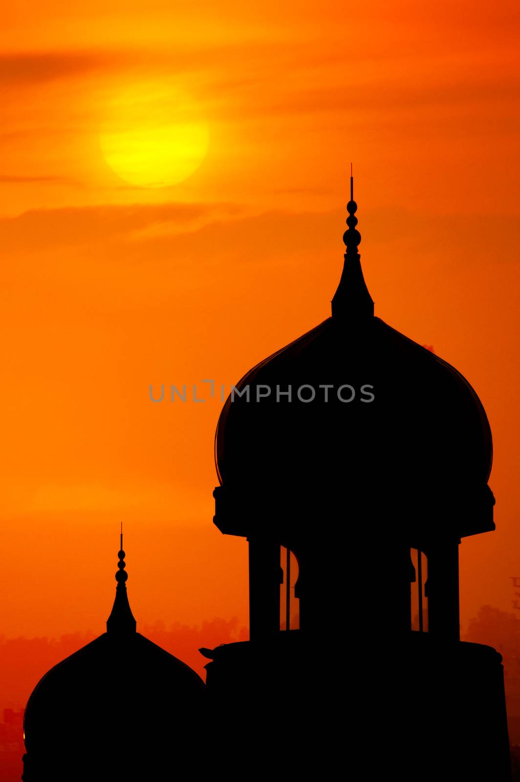 Silhouette of a mosque in sunset.