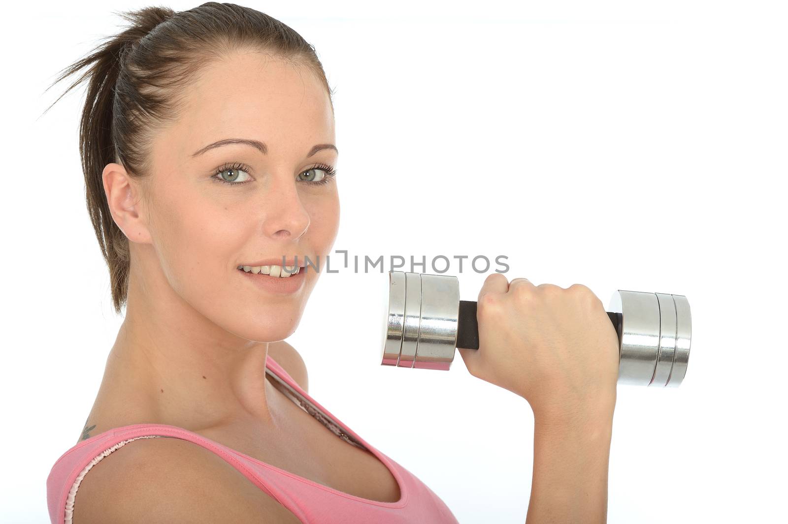 Healthy Happy Young Woman Training With Weights Smiling Looking at the Camera