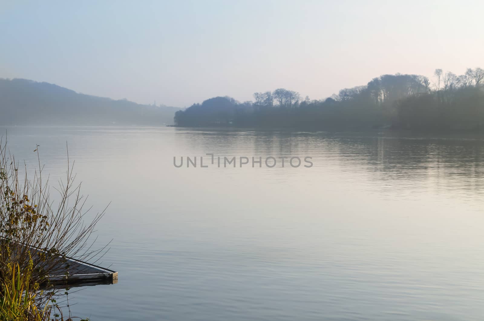 View of the Baldeneysee in morning fog