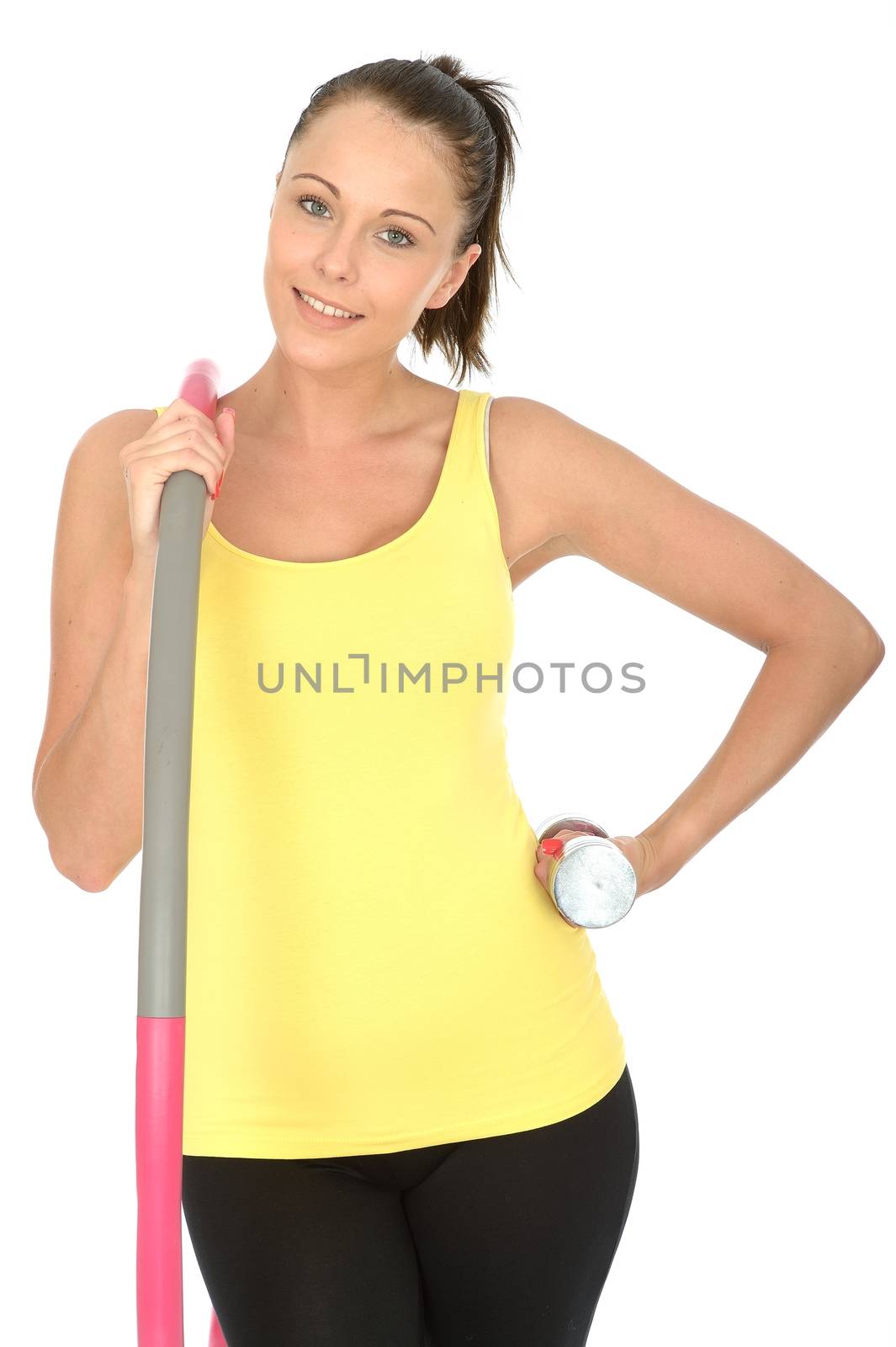 Healthy Young Woman Holding a Dumb Bell and Hula Hoop Smiling and Looking Happy