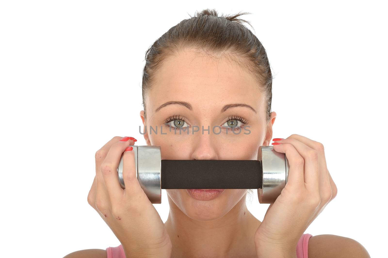 Healthy Young Woman Holding a Dum Bell Across Her Mouth by Whiteboxmedia