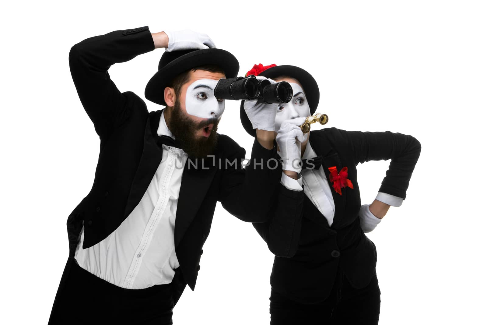 Two memes as business people  looking through two binoculars isolated on white background. concept of search and surprise