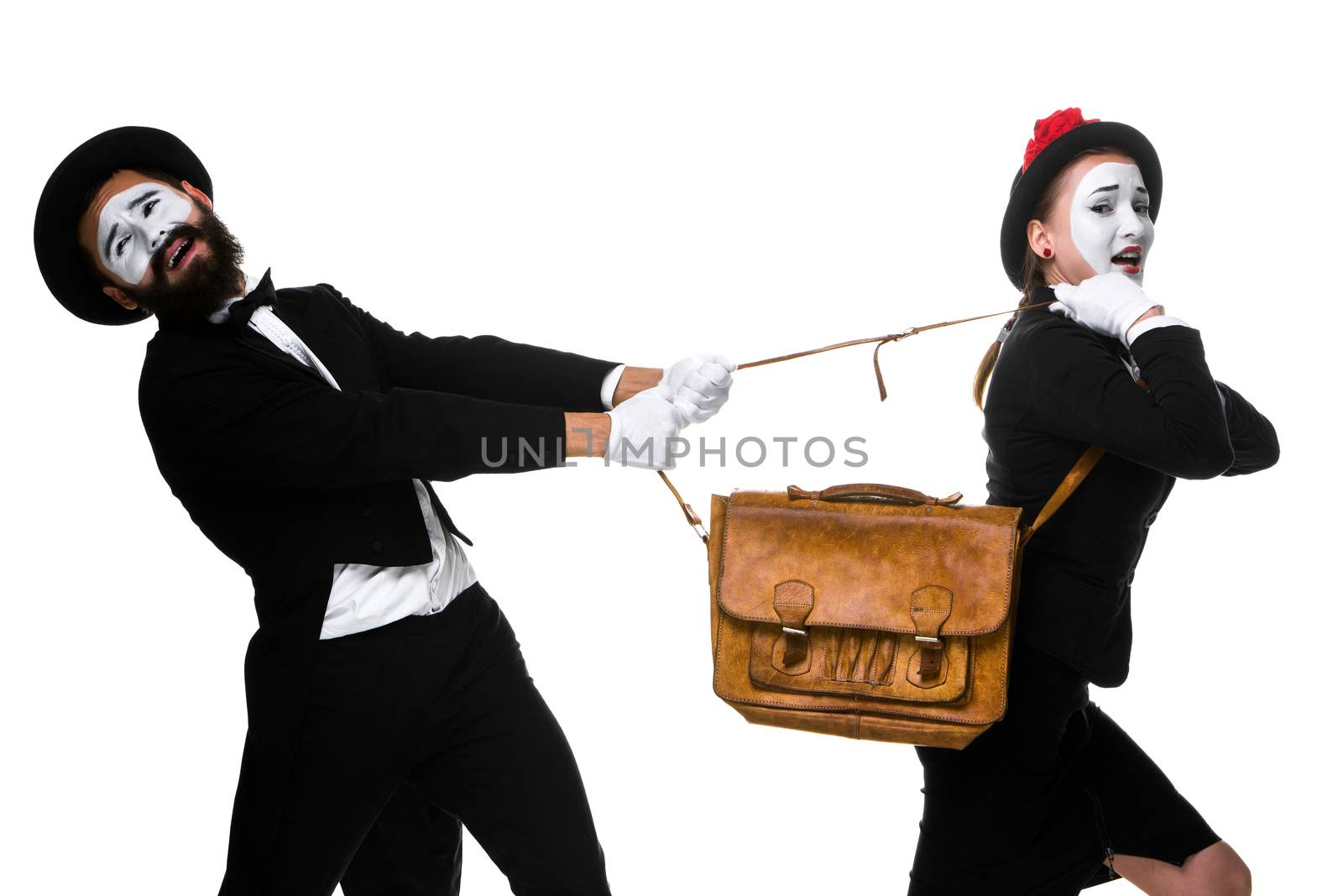 Business man and woman fighting over briefcase by master1305