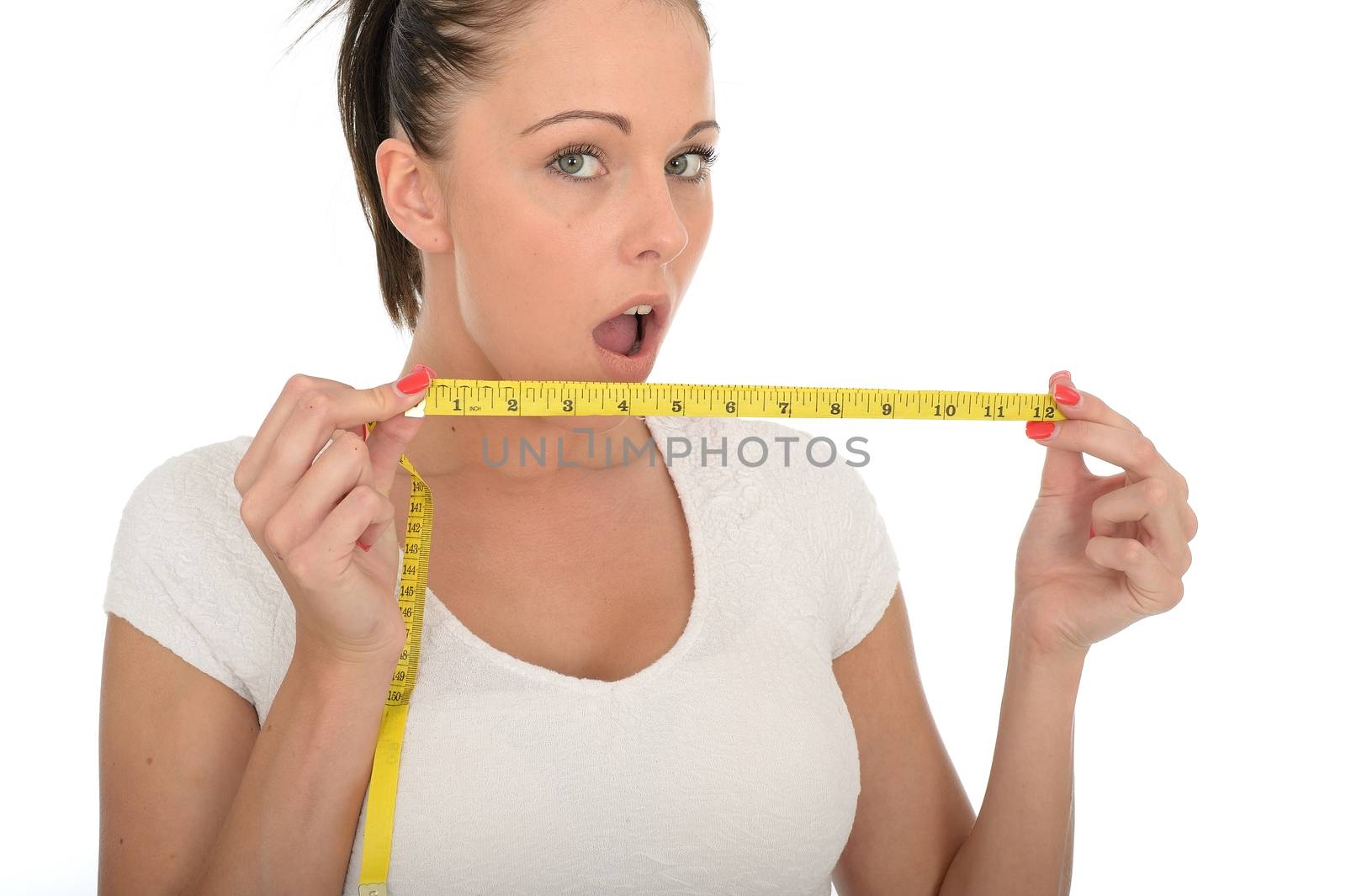 Healthy Young Woman Holding a Tape Measure by Whiteboxmedia