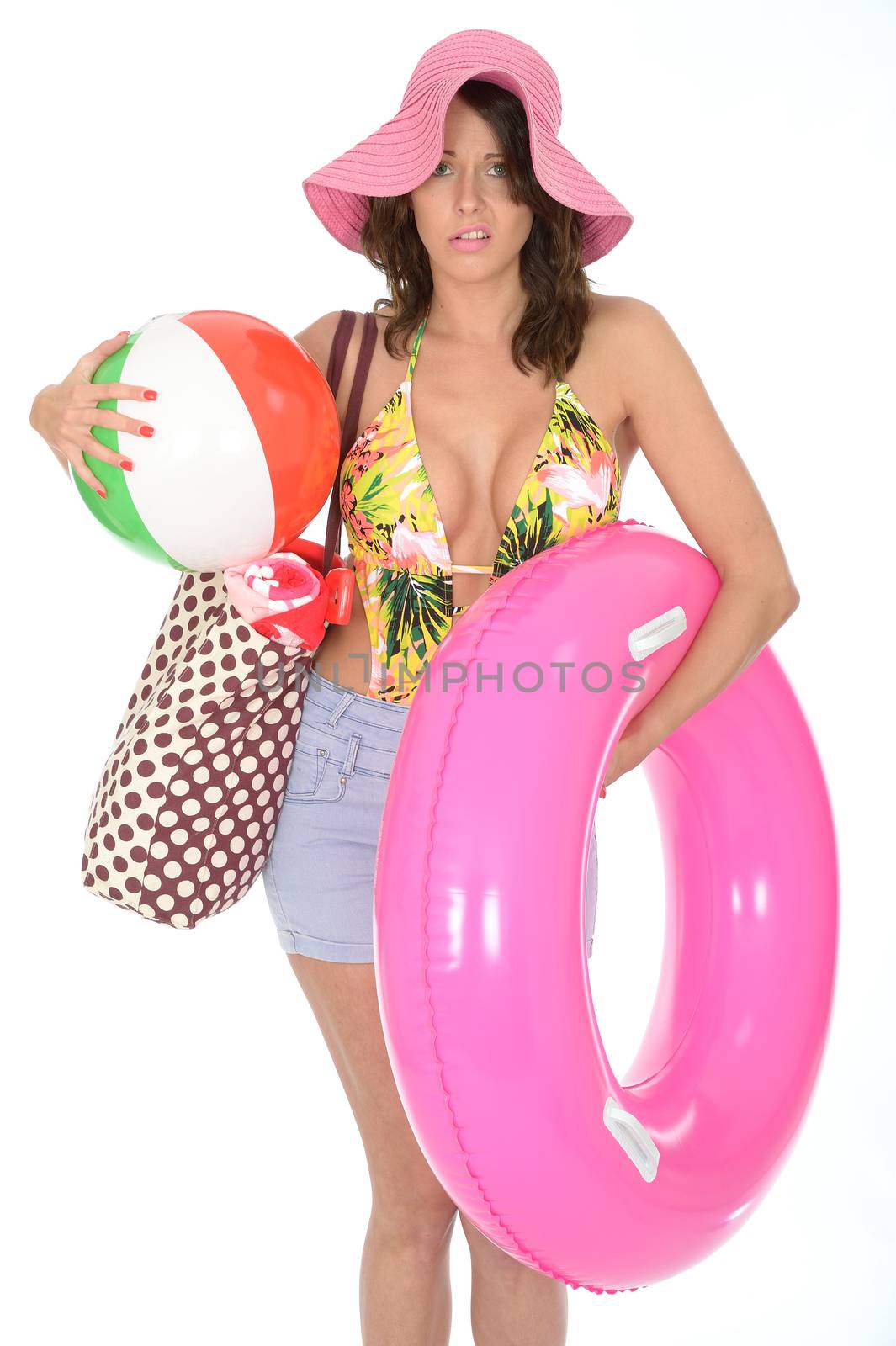 Young Woman Wearing a Swim Suit on Holiday Carrying a Beach Ball by Whiteboxmedia