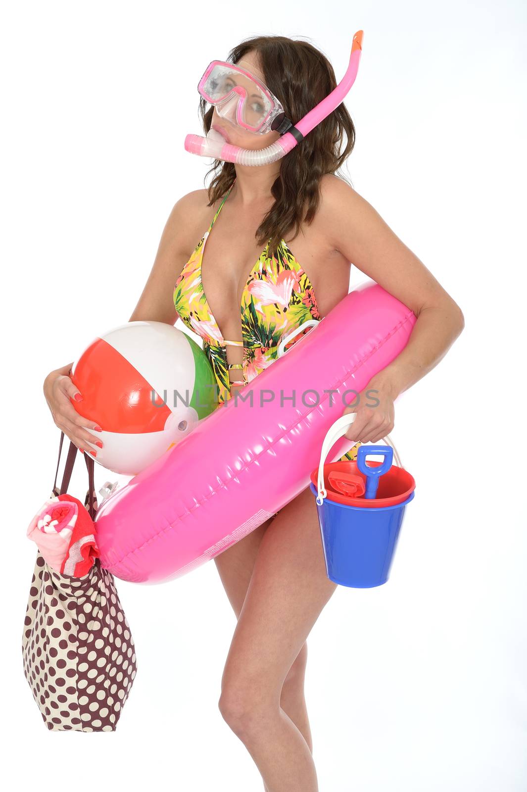 Young Woman Wearing a Swim Suit on Holiday Wearinmg a Snorkel and Rubber Ring