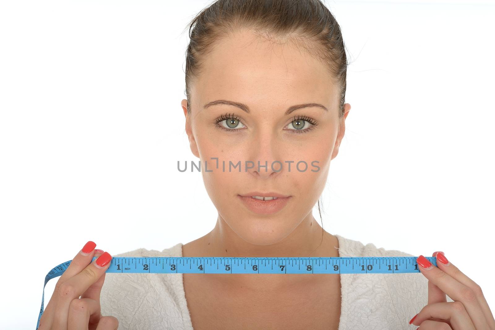 Healthy Young Woman Holding a Tape Measure by Whiteboxmedia