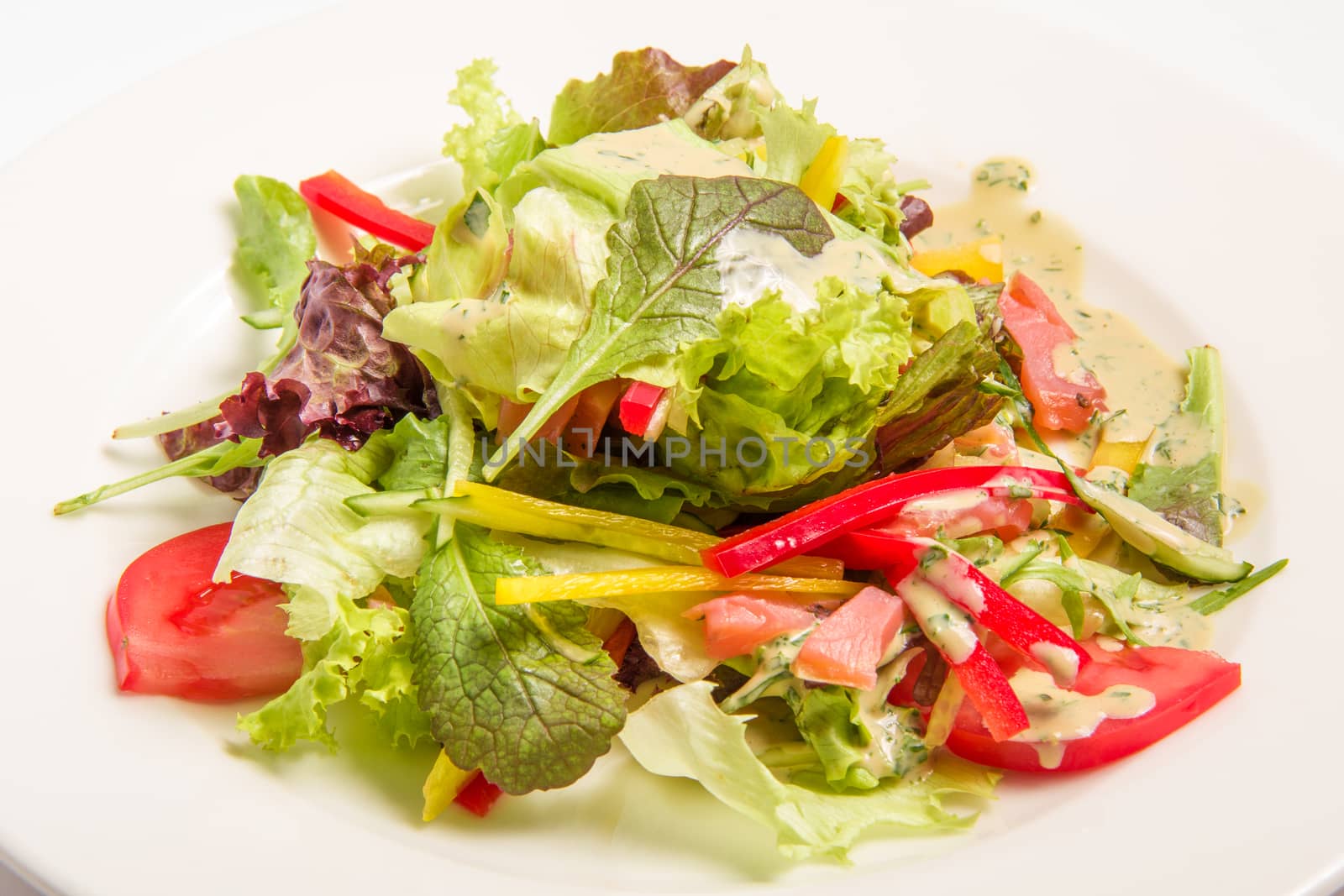 salad with greens vegetables. vegetarian cuisine.. On white background