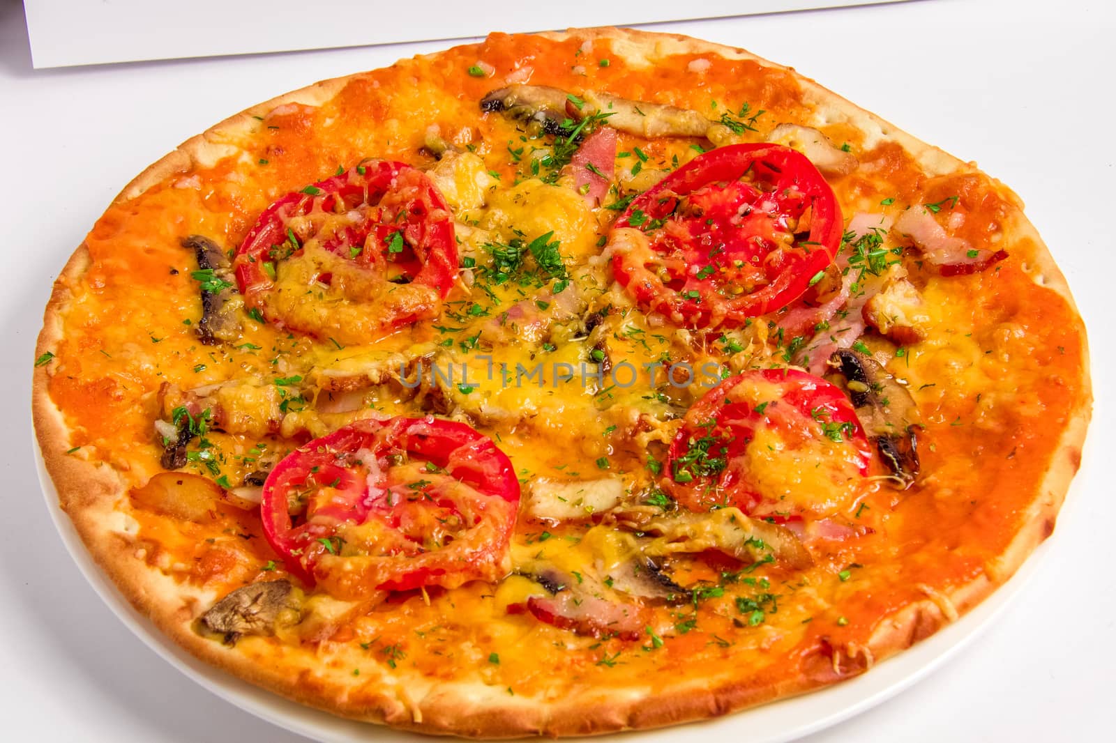 Pizza vegetarian with tomatoes, cheese, mushrooms and bacon