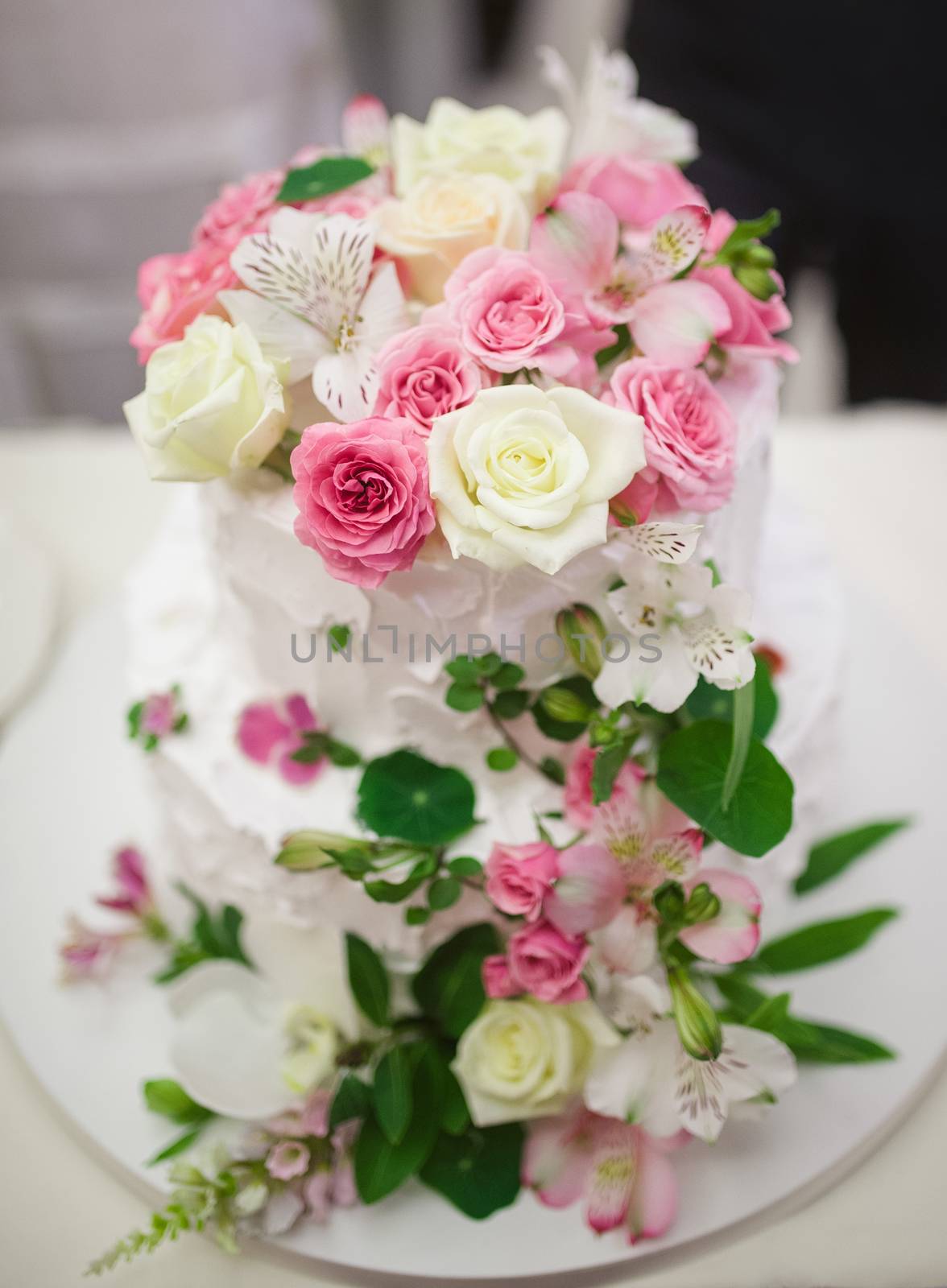 Wedding cake decorated with beautiful flowers by eugenelucky