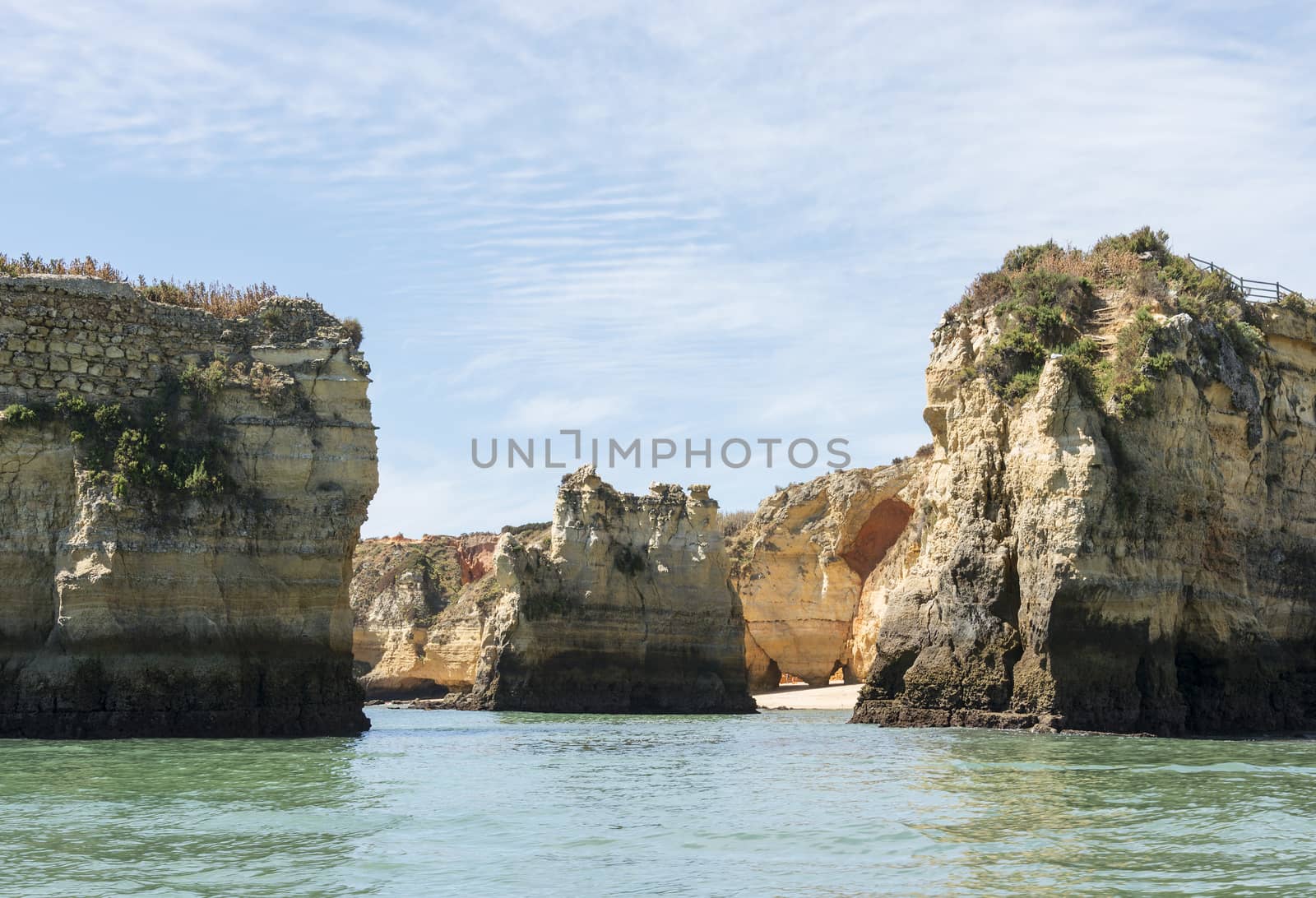 rocks and cliff in algarve city lagos in Portugal, the most beautifull coastline of the world, seen from a boat