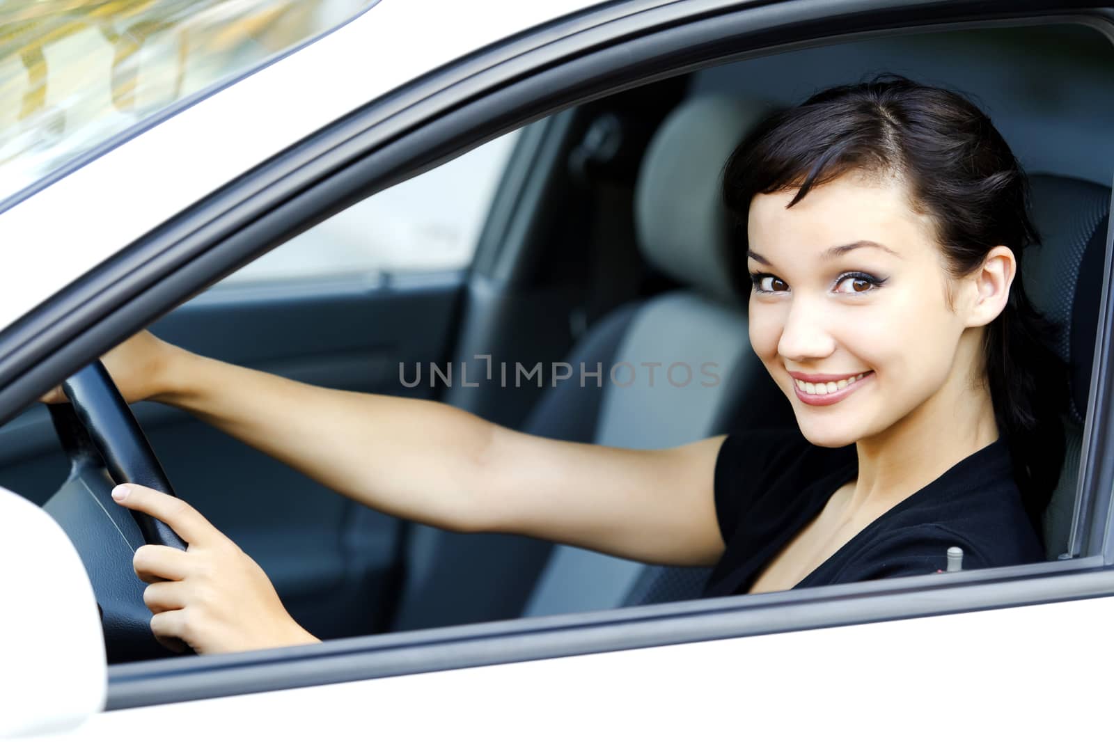 Pretty girl in a car