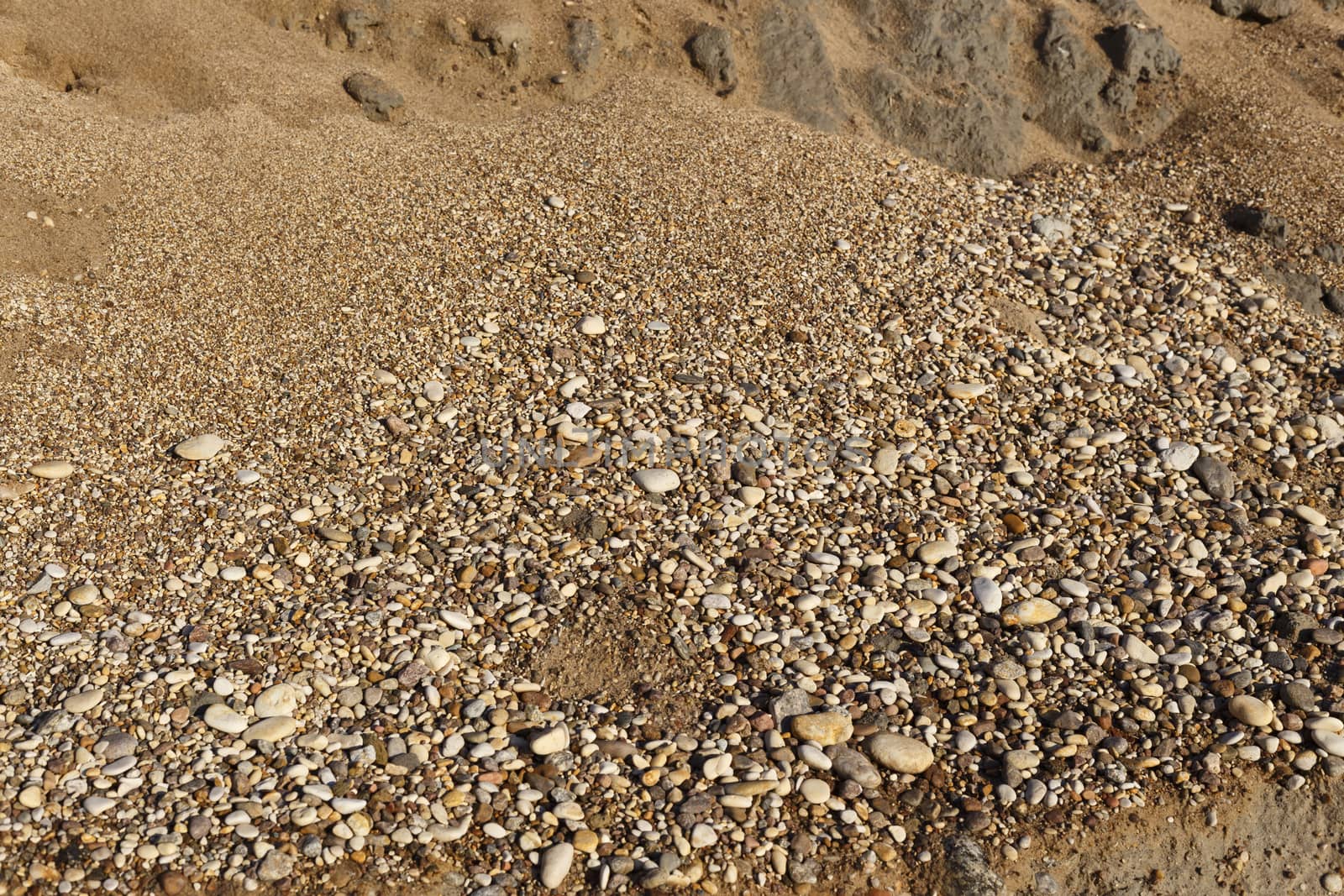 Small gravel stones texture background,sand and shells