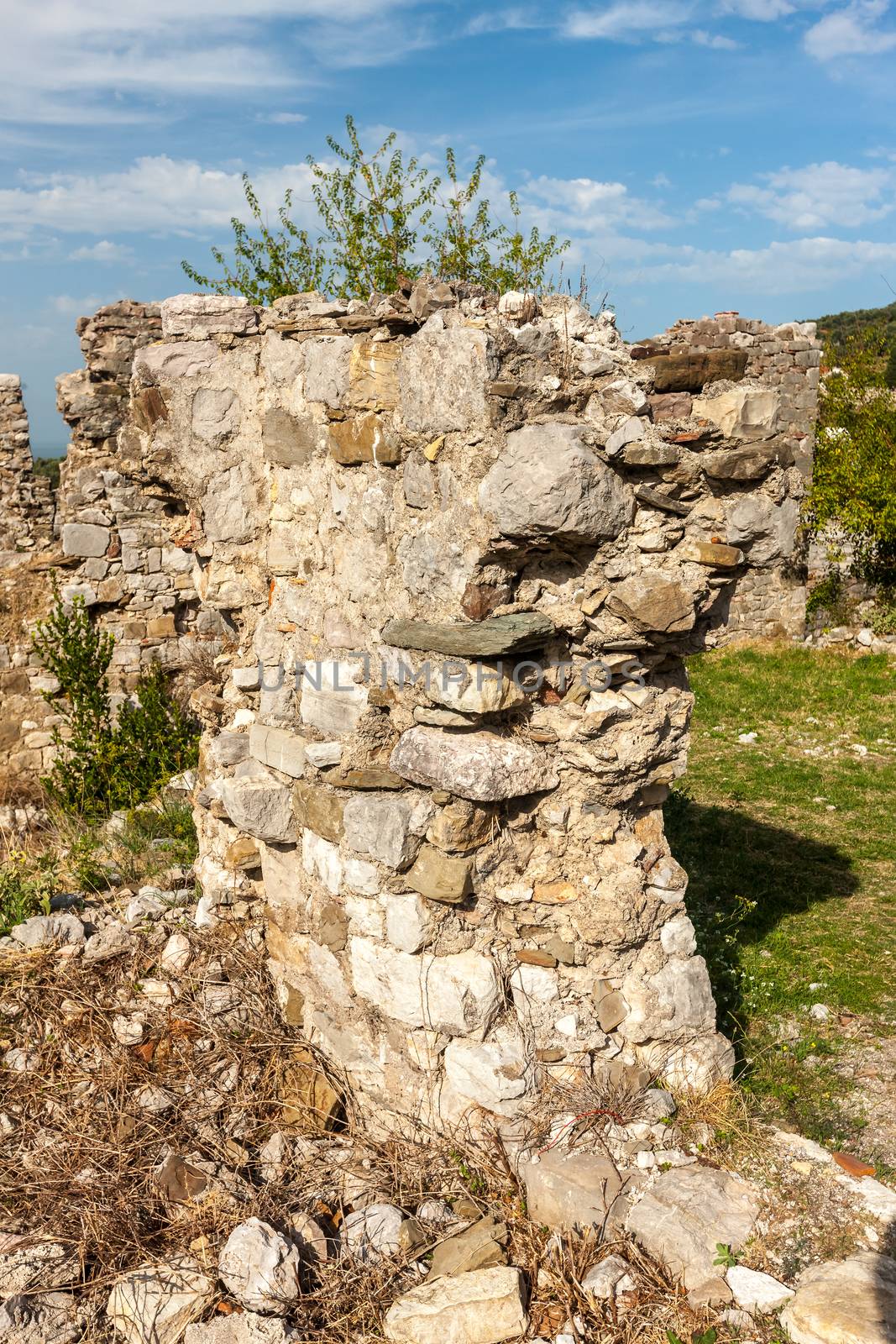 The high fortress walls with the scenic mountains on the background, Stari Bar, Montenegro.