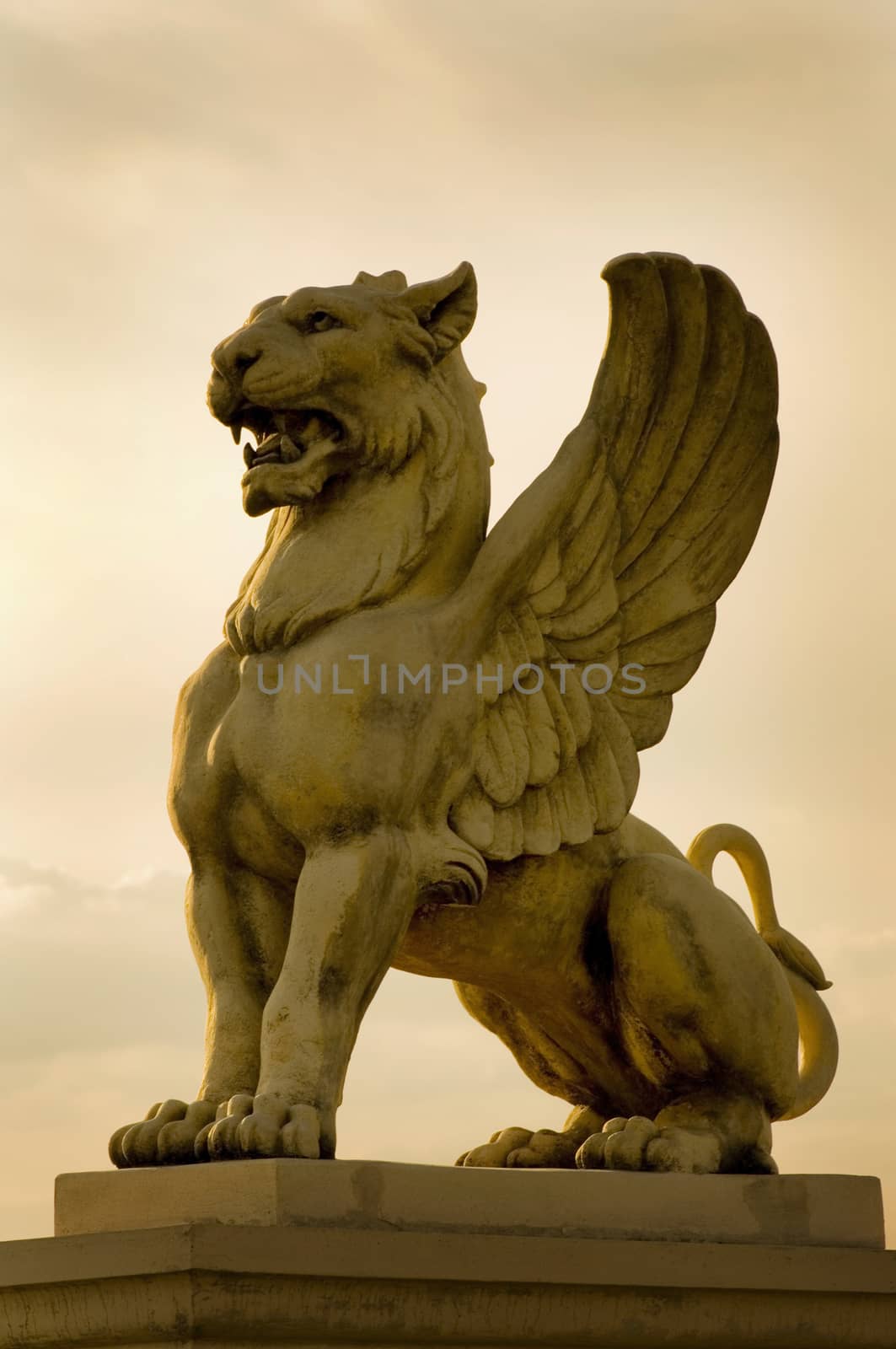 An image of an ancient lion statue