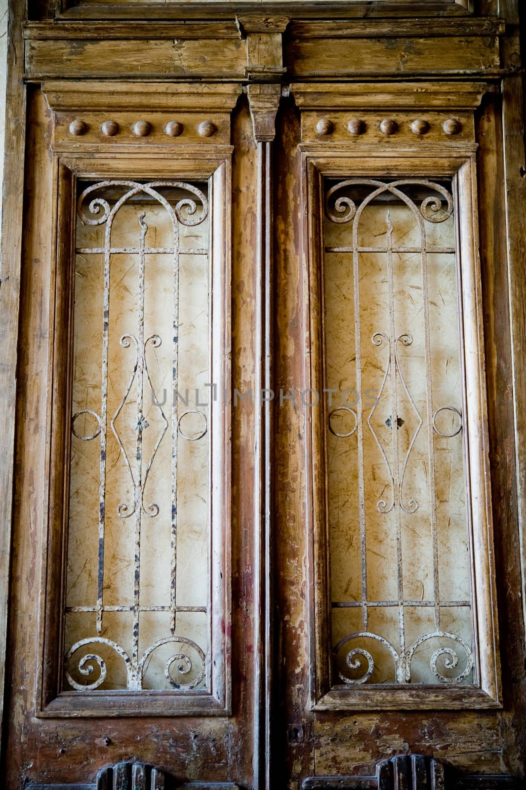 An image of a pair of large rustic doors