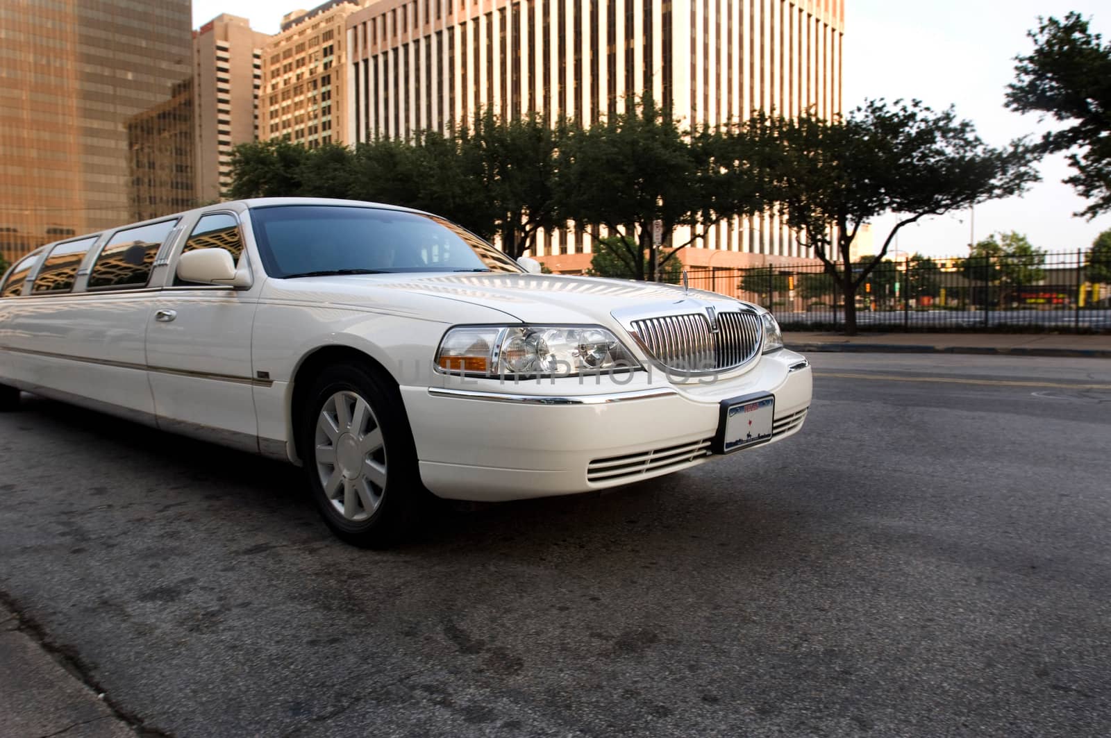 An image of a limo outside in the street