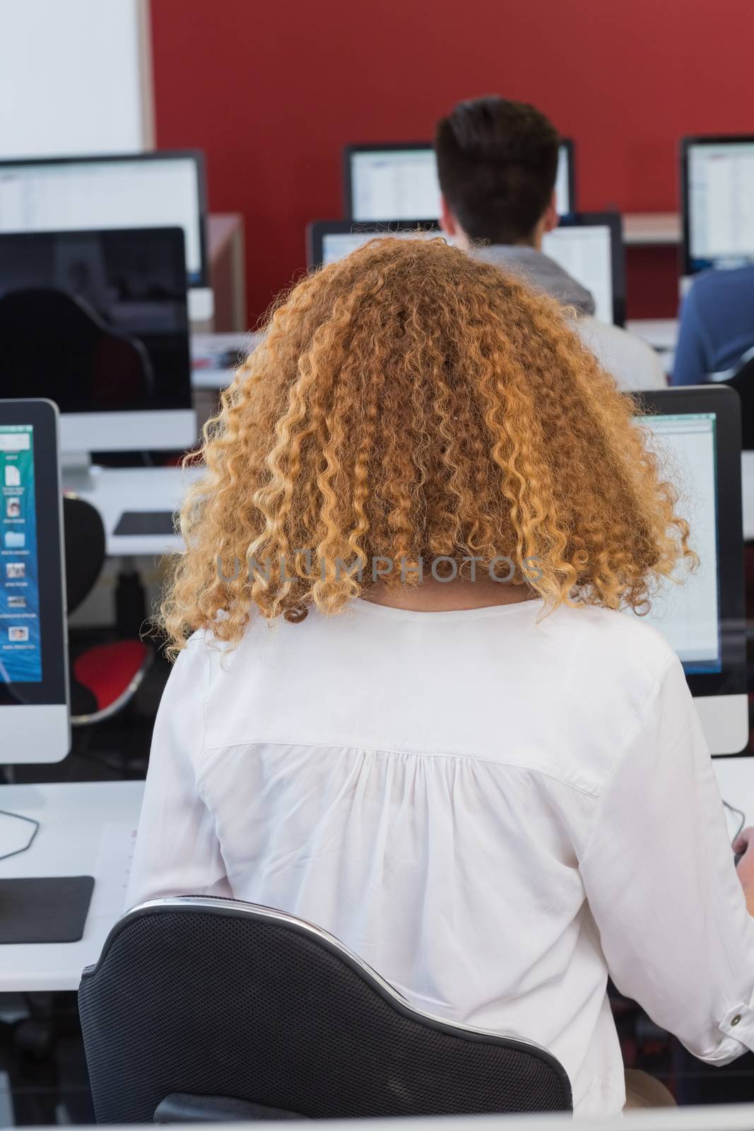 Student working in computer room at the college