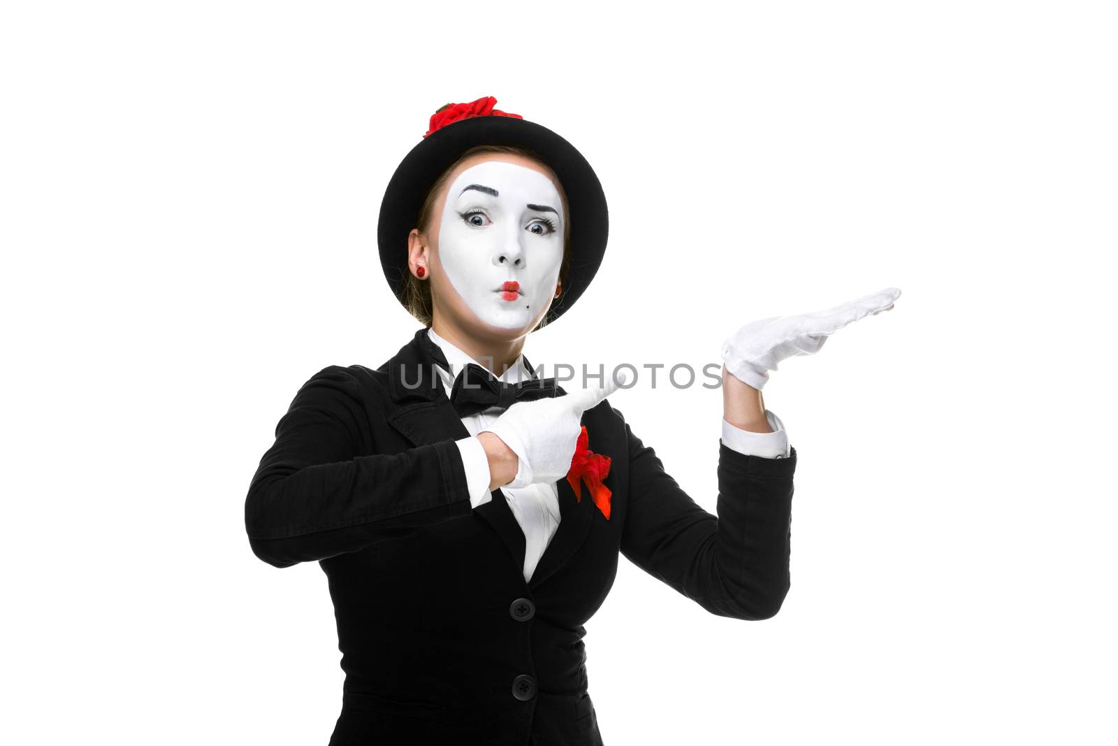 Portrait of the surprised woman as mime isolated on white background. Concept of approval and recommendations