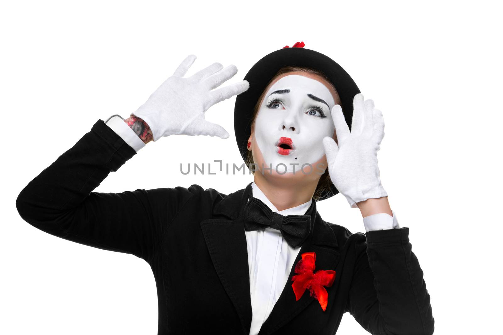 Portrait of the surprised and joyful woman as mime with open mouth isolated on white background. Concept greetings and happiness