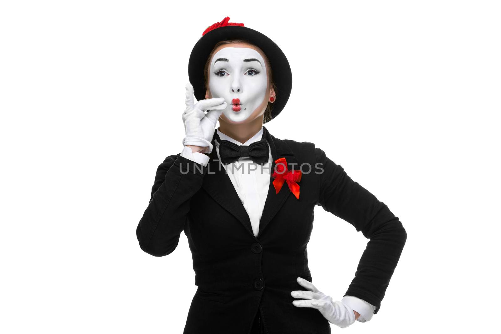 Portrait of the approving woman as mime showing something very small in size, isolated on white background. 