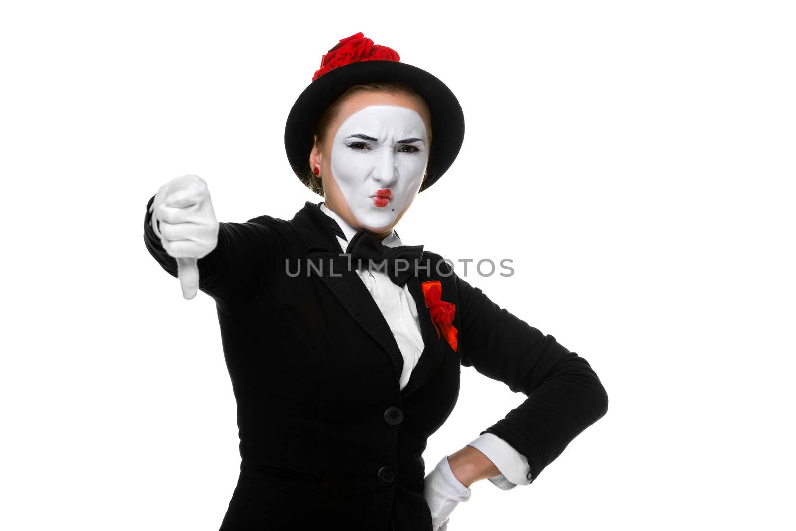 Portrait of the condemning woman as mime with dissatisfaction with a grimace on his face isolated on white background. Concept of  of rejection and condemnation