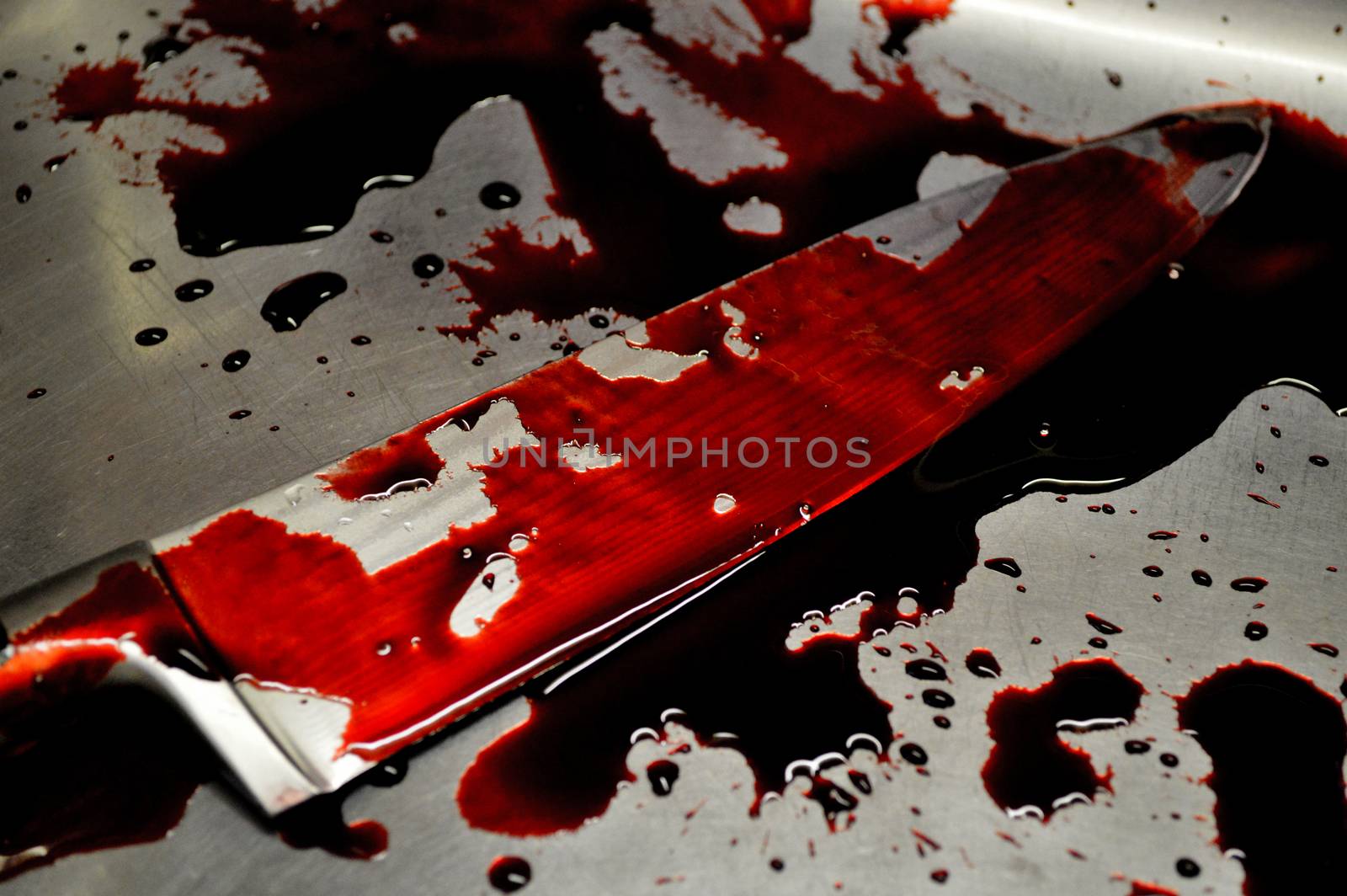 Illustration photo - Bloody knife, crime scene.